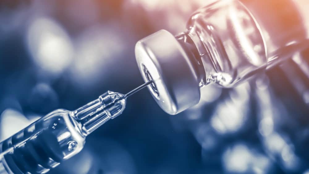 Vaccine vial dose flu shot drug needle syringe,medical concept vaccination hypodermic injection treatment disease care hospital prevention immunization illness disease